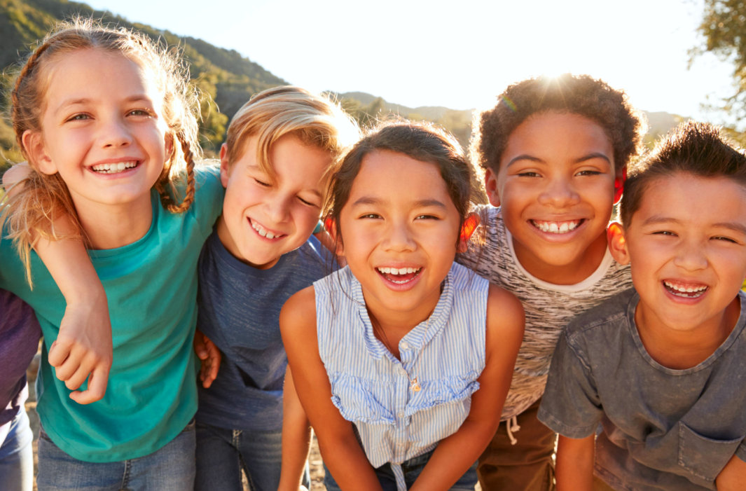 image of five kids smiling